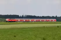 In der Ferne br�llt der TB11 der 218 486-9 mit dem RE von M�nchen nach Memmingen kurz vor Buchloe am 07.07.2013