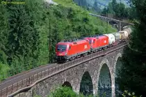 �BB 1116 + �BB 1016 mit gemischten G�terzug am 13.07.2013 auf dem Hundsdorfer Viadukt bei Bad Hofgastein. 