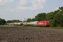 HGK 185 605 mit einem Kesselwagenzug am 10.07.2013 bei M�nchen Feldmoching.