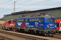 Die  sch�n bunte  EK-Lok 1042 520 hat sich am 10.06.2006 im Bahnhof Trier ins beste Licht gesetzt 
