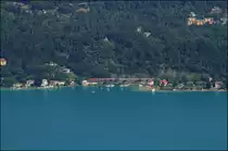 Eine 1116 f�hrt mit EC 112 am Ufer des W�rthersee entlang.
P�rtschach am W�rthersee 17.07.13.