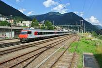 Heute verkehrte als IR 2261/2286 (Z�rich-Chiasso-Z�rich) ein EWIV Pendelzug. Normalerweise verkehren keine Pendelz�ge am Gotthard. Der Pendel besteht aus dem Bt IC 50 85 28-94 986-2, 3 B EWIV, 2 A EWIV, Re 460 026-8, D ex. SNCF und 2 B EWII (NL). Im Bild f�hrt der IR 2286 in Airolo ein, 04.08.2013.