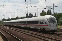 Hier 411 519-2  Mei�en  als Leerzug, bei der Durchfahrt am 1.7.2013 durch Berlin Sch�nefeld Flughafen, in Richtung Genshagener Heide.
