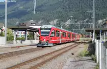ABe 8/16 3104 ''Achilles Schucan'' am 10.8.2013 in Bonaduz als S2 nach Chur. Erst ein Umlauf der S1/S2 wird mit den neuen Stammnetz-Allegras gefahren, da sich Inbetriebnahme dieser Fahrzeuge verz�gert.