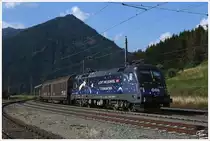 1116 126  Licht ins Dunkel  f�hrt mit einem G�terzug in den Bahnhof Scheifling ein. 
22.8.2013