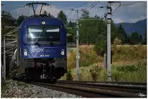 Teleaufnahme der MGW 183 500, welche mit einem Kesselzug durch das Aichfeld rollt. 
Zeltweg 11.8.2013