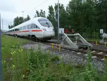 In der eingez�unten Binzer Abstellanlage lie� sich der 411 091,am 29.Juni 2013,nur durch den Zaun fotografieren.