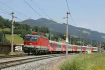 1144 265 mit REX 1506 Salzburg Hauptbahnhof-W�rgl Hauptbahnhof bei Brixen im Thale am 24-7-2013.