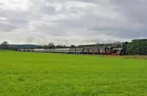 Die Reutlinger Zahnrad Dampflok 97 501 die dem Verein(Freunder der Zahradbahn Honau-Lichtenstein ZHL)geh�rt f�hrt den Sonderzug auf der Schw�b.Waldbahn nach Welzheim.Das Bild entstand bei dem kleinen Ort Miedelsbach am 8.9.2013.Am Zugschlu� l�uft eine V 60 der ESG mit um ein Umsetzen der Dampflok in Welzheim zu vermeiden.
