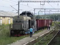 80-0522-5 mit einem G�terzug, fotografiert auf dem Weg von Timioare nach Sibiu beim Halt in Orastie. 27.08.2013 um 12:50 Uhr. 