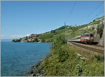  Swiss-Express  Re 4/4 II mit einem IR bei St-Saphorin.
9. Sept. 2013 