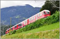 Vierteiliger Allegra 3104 als S1 1515 nach Thusis nach der Verzweigung in Reichenau-Tamins. (10.09.2013)