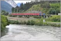 RE1133 nach St.Moritz mit Ge 4/4 III 652 in Reichenau-Tamins. (10.09.2013)