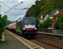 Die ES 64 U2-009 von MRCE ist mit einem Fl�ssiggaswagenzug in Richtung Neuwied fahrend hier in Leubsdorf zu sehen. 14.9.2013