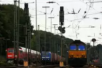 Die Class 66 DE6307 von DLC Railways steht in Aachen-West und wartet auf die Abfahrt nach Antwerpen-Berendrecht(B) mit einem sehr langen MSC-Containerzug und im Hintergrund steht die 145 CL-204 von Crossrail mit einem langen Containerzug aus Zeebrugge(B) nach Gallarate(I) und wartet auf die Abfahrt nach Aachen-Hbf,K�ln bei Sonne und Wolken am 31.8.2013.