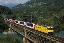 Die meiner Meinung nach etwas zu grell geratene Ge 4/4 III 644 erreicht am 31.08.2013 mit dem doppelten Glacier-Express D 905/907 Reichenau-Tamins. Eine gewisse Zeit lang war diese Lok die einzige Ge 4/4 III, welche im normalen RhB-Anstrich verkehrte.