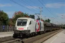 �BB Werbelok 1116 264  Hitradio �3  mit G�terzug bei der Durchfahrt in Elsbethen Richtung S�den am 25.09.13