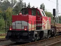 V150.05 BBL04(214 013-5)ist vom 11.10.2013-14.10.2013 mit einem Bauzug im Bahnhof Rostock-Bramow zu Gast Grund sind Weichenarbeiten. 