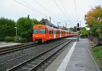 Mittlerweile bereits Geschichte: Be 4/8 42 (nicht mehr in Betrieb) und Be 4/12 53  Lugano  als S8 bei Einfahrt in Urtenen. Auf der S8 verkehren mittlerweile keine Mandarinli mehr, 10.10.2013.