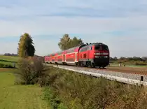 Die 218 444 mit einem RE nach M�hldorf am 26.10.2013 unterwegs bei Weidenbach.