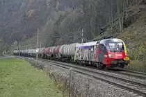 1116 153 zieht am 18.11.2013 einen Kesselwagenzug zwischen Bruck/Mur und Pernegg Richtung S�den.