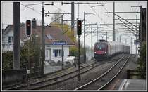 Railjet 165 mit 1116 207 in Tr�bbach. (21.11.2013)
