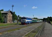 T478 1002 mit einem Sonderzug am 14.09.2013 bei der Einfahrt in Lu�n� u Rakovn�ka.