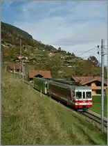 Der AOCM Regionalzug 43 auf Talfahrt kurz vor Val d'Illiez.
25. Okt. 2013