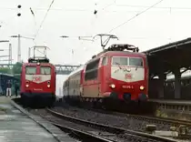 141 404 mit N 5349 (Tostedt–Hamburg) und 103 176 mit IC 524  Hanseat  (N�rnberg–K�ln–Kiel) am 25.05.1994 in Buchholz (Nordheide)