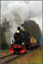 Mit Volldampf in das neue Jahr 2014. Einen guten Rutsch wünscht Euch allen der Stefan. Hier zu sehen die 1040 der ZLSM mit ihren Sonderzug am Haken kurz vor Simpelveld (Niederlande),am 29.Dez.2013.