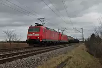 Am 03.01.2014 fuhr die Mannheimer 185 123-7 zusammen mit ihrer Schwester 185 342-3 in DT einen kurzen gemischten Güterzug nördlich von Müllheim (Baden) bei Hügelheim gen Schweizer Grenze.