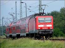 143 303-6 mit RB33323 verl�sst den R�gendamm in Richtung Altef�hr.(bei Stralsund am 18.06.06) 
((mit 2.R�cklicht und ohne Schild ;-) ))
