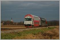 So ein Bild gab es schon einmal im Fr�hjahr, allerdings mit einer anderen Garnitur, und nicht so einer Stimmung im Hintergrund. Es zeigt den GKB R 8571 (Graz-Wies Eibiswald) am 13.11.2006 kurz nach Gro� St. Florian. Eine Minute vorher war der Kirchturm von Gro� St. Florian ebenfalls noch im sch�nsten Licht!

