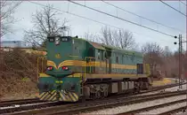 SŽ 644-018 fährt als Lokzug durch Maribor-Tabor Richtung Studenci Bahnhof. /27.12.2013