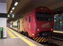 Malpensa-Express EA 761-008 am 14.11.2006 im Flughafen-Bahnhof Mailand-Malpensa, der Zug f�hrt von hier ca. 40 km nonstop bis in die City. Ich habe den Zug hier mit eingeordnet, weil er �u�erlich genau der Baureihe Ale 506 der FS entspricht, nur andere Lackierung. 