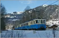 Der MOB ABDe 8/8 4003  Bern  mit dem Regionalzug 2224 Montreux - Zweisimmen zwischen Saanen und Gstaad bei Kilometer 44.4. 
3. Februar 2014