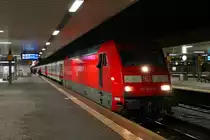 Am frühen Morgen des 04.02.2014 stand die Hamburger 101 041-2 mit dem IC 60419/CNL 479 (Hamburg-Altona/Mannheim Hbf - Basel SBB/Zürich HB) in Basel Bad Bf bei einem Personlwechsel auf Gleis 3.