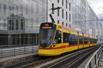 Tango 168 auf der Linie 11 bei der Haltestelle Peter Merian. Die Aufnahme stammt vom 08.02.2014.