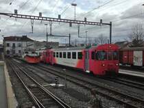 Bt 51 und Be 4/4 1 stehen abfahrbereit in Yverdon-les-Bains, 13.02.2014.