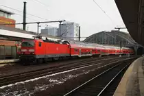 Hier 143 641-9 mit einer RB14 (RB18914) von Berlin Schönefeld Flughafen nach Nauen, bei der Ausfahrt am 3.2.2014 aus Berlin Ostbanhof.