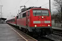 Ausfahrt am 28.02.2014 von der Freiburger 111 048-5 und der RB 26571 (Offenburg - Basel Bad Bf) in Müllheim (Baden) gen Auggen.
