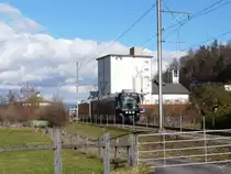 AAR - Nachschuss eines Schwarzen Werbetriebwagen ABe 4/8 unterwegs bei Muhen am 22.02.2014