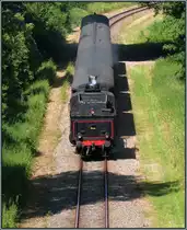 Mit Tender voraus geht es zurück nach Simpelveld für die SJ 1040 der ZLSM mit einen Sonderzug an einen heißen Julitag 2013.Hier zu sehen bei Spekholzerheide,unweit von Kerkrade in den Niederlanden.