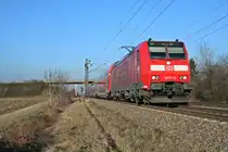 146 111-0 mit einem RE von Offenburg nach Basel Bad. Bf am Nachmittag des 31.01.14 bei H�gelheim.