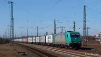 185 619-4 LOCON rollt am 09.03.14 mit einem Containerzug durch Buchholz Richtung Hamburger Hafen.
