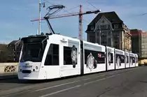 Seit Montag 17.03.2014 macht der Combino 301 Werbung für die Uhren-marke Tissot. Die Aufnahme stammt vom 18.03.2014.