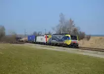 189 912 + 185 665 mit einem Containerzug am 08.03.2014 bei Ostermünchen.