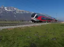 Mit Blick auf die Berge des Alpsteins begegnete dem Fotografen am 07.03.2014 bei Salez-Sennwald ein Stadler-FLIRT der S�dostbahn, unterwegs als S4 23443 von Uznach �ber St. Gallen nach Sargans.