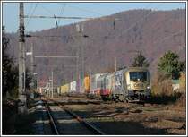 1116 250 mit der RoLa 41401 von Wels nach Marburg am 24.11.2006 aufgenommen in Graz-G�sting. Sie hat diesen Zug bis zum Grenzbahnhof zu Slowenien, Spielfeld Stra�, bespannt