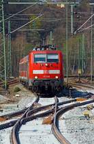 Nachdem die Doppelkreuzweichen (im Vordergrund Nr. 83) in Betzdorf erneuert wurden, fahren die Züge wieder und der SEV ist vorbei.  

Die 111 096-4 der DB Regio NRW mit n-Wagen (ex Silberlinge) als RE 9 - Rhein-Sieg-Express (Aachen-Köln-Siegen), Umlauf RE 10913, am 30.03.2014 bei der Einfahrt in den Bahnhof Betzdorf/Sieg.